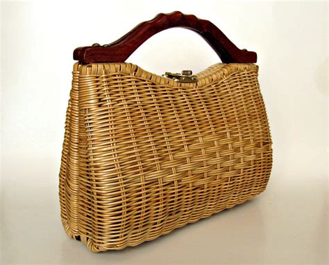 Vintage wicker purse with wooden handle. by rekindledpassions