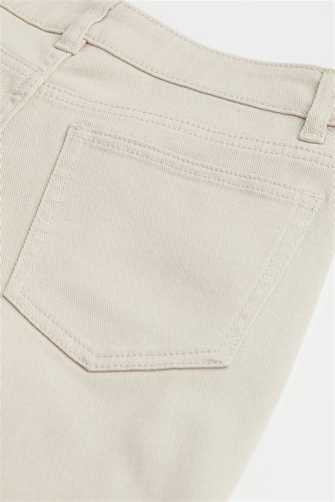 Low Waist Flared twill trousers - Light beige - Ladies | H&M IN