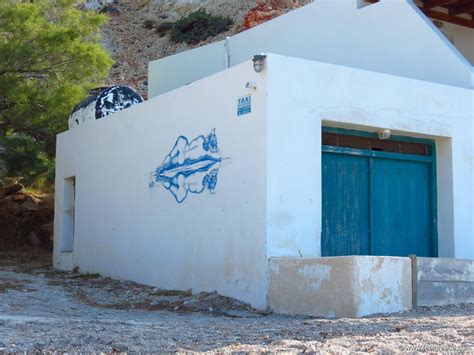 Wall painting and taxi sign; photo 40311 from Firopotamos