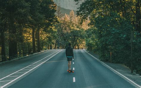 Download wallpaper 2560x1600 skateboard, road, man, trees, skating ...