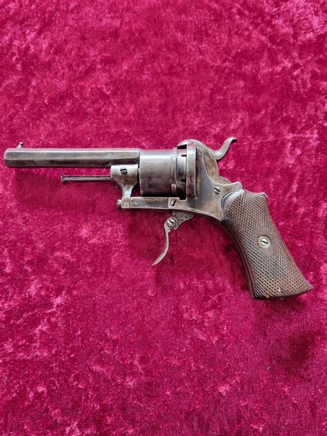 Image result for 7 Round Revolver