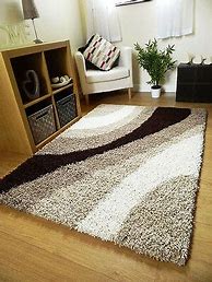 Cream shaggy rug