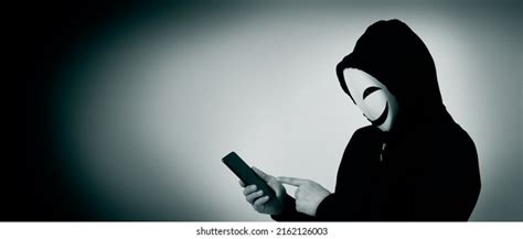 Anonymous Hacker Face Mask Smartphone Hand Stock Photo 2162126003 | Shutterstock