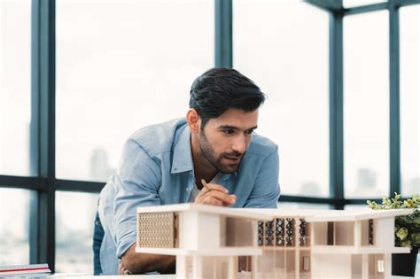 Smart civil engineer looking while planing design house construction ...