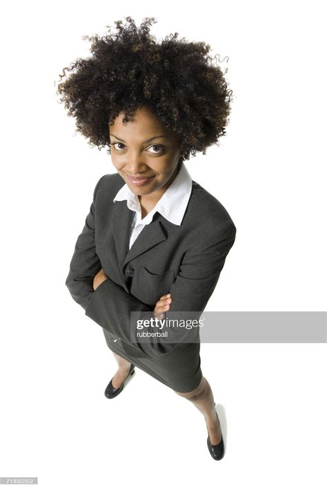 High angle view of a businesswoman with arms crossed | Body reference ...