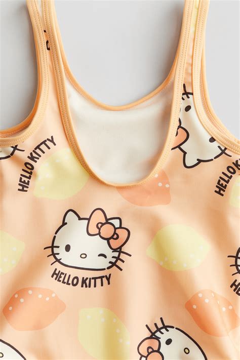 Printed swimsuit - Orange/Hello Kitty - Kids | H&M IN
