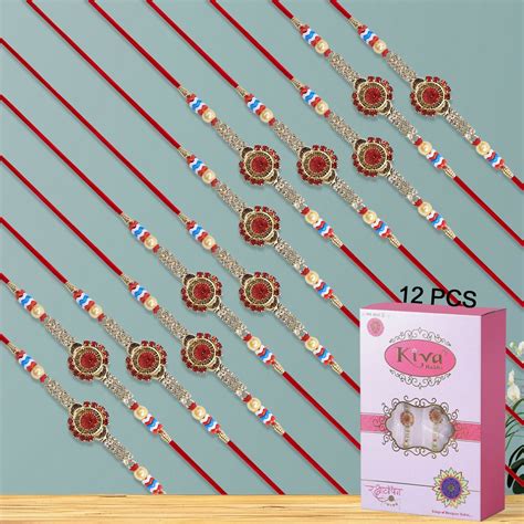 Pack of 12 Designer Rakhis with Red Flower Centerpiece and Sparkling S ...