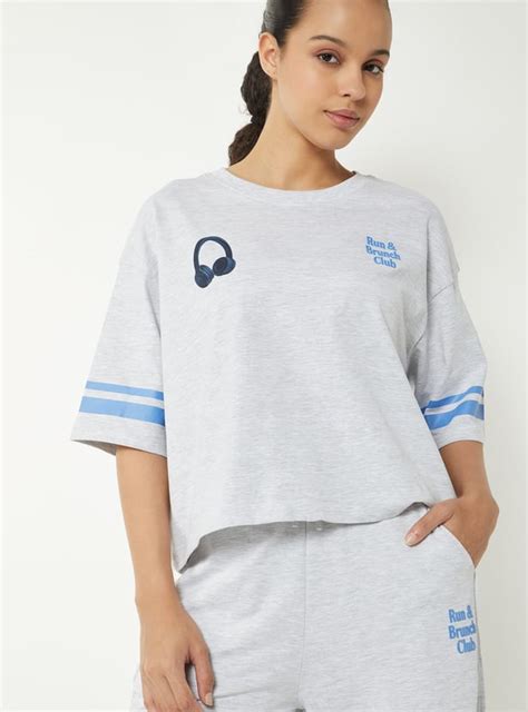 Buy Women Printed Boxy Fit Sports T-shirt Online at just Rs. 599.0 ...