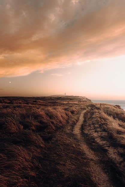 Phare de Rubjerg Knude au coucher du soleil | Photo Gratuite