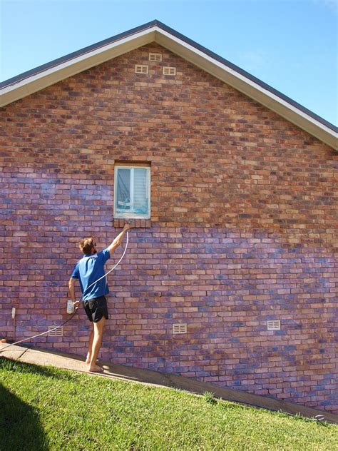 Painting the exterior brick walls of our home | Glamour Coastal Living