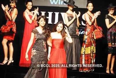 Krishna Somani presents a creation by designer Mandira Wirk during a ...