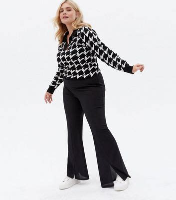 Curves Black Ribbed Split Front Flared Trousers | New Look