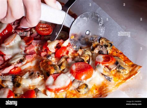 Image result for Someone Using Pizza Cutter