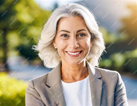 Premium Photo | Portrait outdoor beautiful smiling 55 year old woman ...