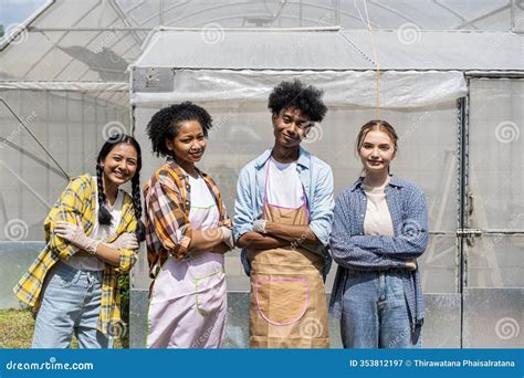 Young Farmer Group. Happy Family with Harvest Vegetable in Garden Stock ...