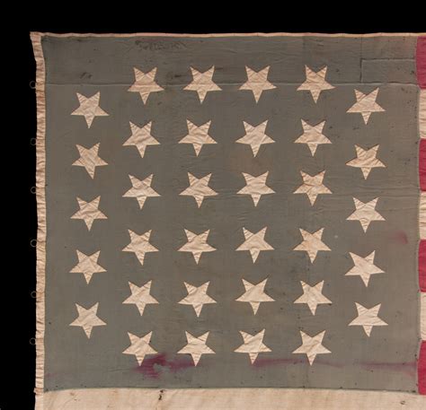 34 HAND-SEWN, UPSIDE-DOWN STARS ON A HOMEMADE, ANTIQUE AMERICAN FLAG ...