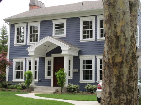 Exterior update... blue siding, white trim, wood door. | Yard ...