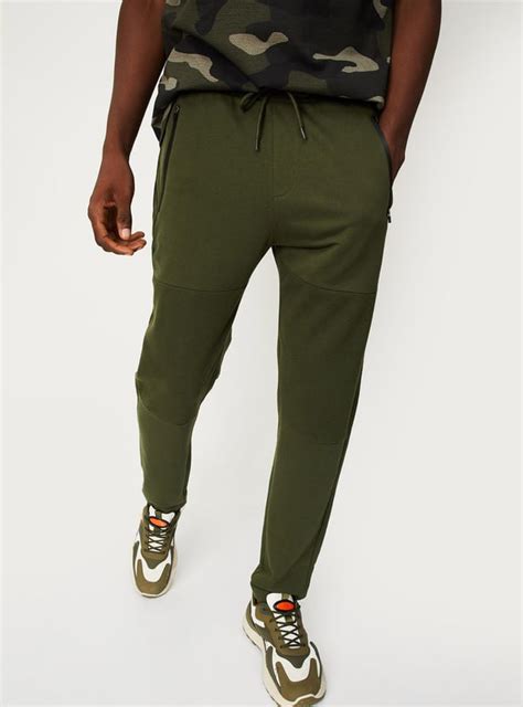 Buy Men Ribbed Athleisure Track Pants Online at just Rs. 999.0 ...