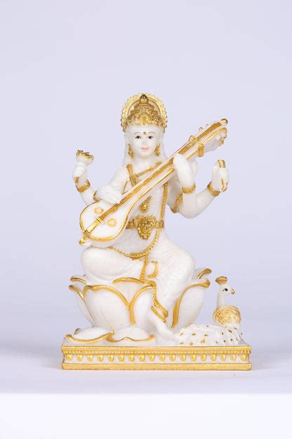 Saraswati Sitting Gold toned Marble statue on lotus with Veena – Mirana ...