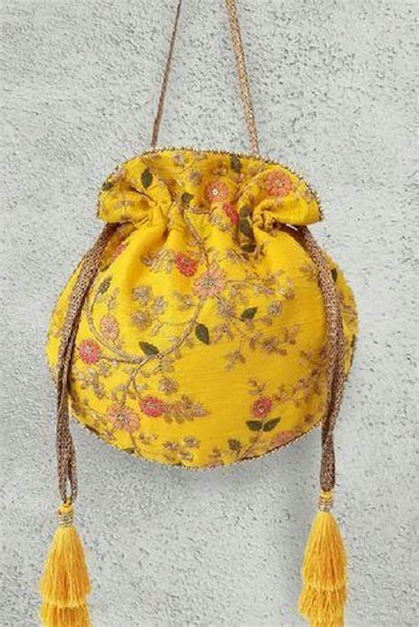 Buy AMYRA Floral creeper potli bag yellow Online in India - The AMYRA Store