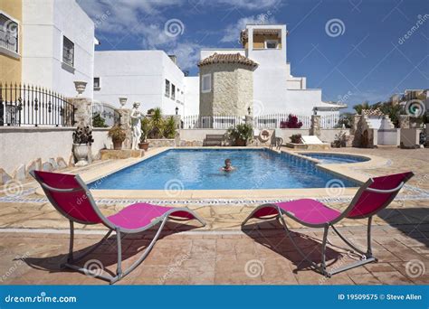 Spanish Vacation Resort - Swimming Pool Stock Image - Image of sunbed ...