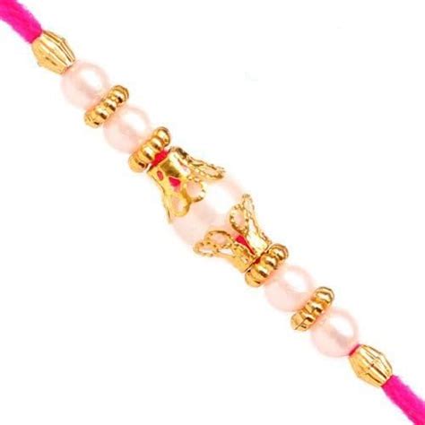 Buy Charming Pearls, Beads and AD Studded Rakhi Online at Low Prices in ...