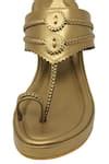 Buy Gold Kolhapuri Metallic Wedges by Aprajita Toor Online at Aza Fashions.