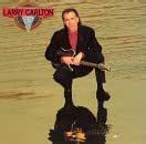 On Solid Ground: Carlton, Larry: Amazon.in: Music}
