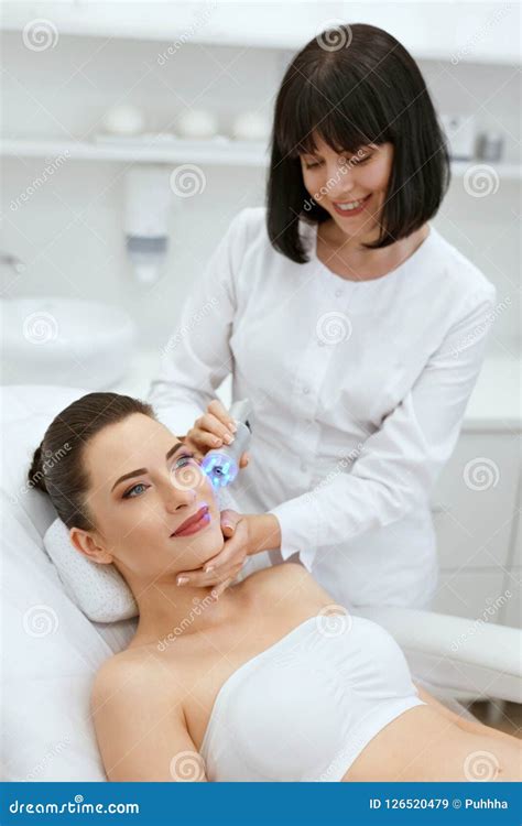 Skin Care. Woman on Facial Blue Light Stimulation Treatment Stock Image - Image of cosmetician ...