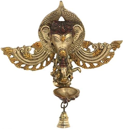 Exotic India Wall Hanging Ganesha Mask with Dancing Ganesha Lamp with ...