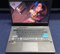 ASUS ROG Zephyrus G14 Alan Walker Special Edition Gaming Laptop, 14" 120Hz Pantone Validated WQHD Display GeForce RTX 3050 Ti, AMD Ryzen 9 5900HS 的图像结果