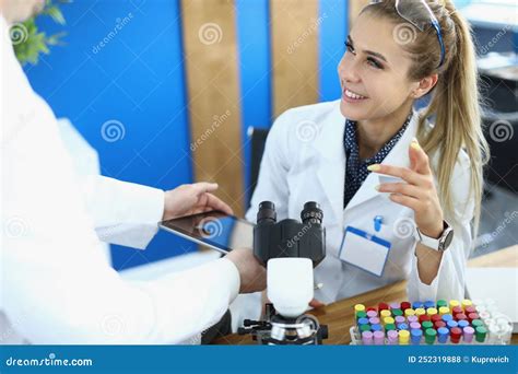 Physician Scientists Colleagues Smile and Communicate in Laboratory Stock Photo - Image of ...