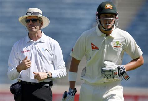 A visibly sick Matt Renshaw clenches his stomach | ESPNcricinfo.com