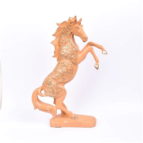 An Orange Horse with Both Front Legs Lifted – Aurance