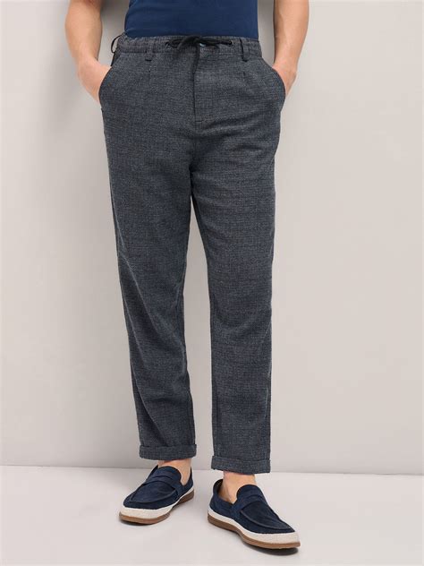 Shop Grey Self Design Tapered Fit Elasticated Waist Casual Trouser ...