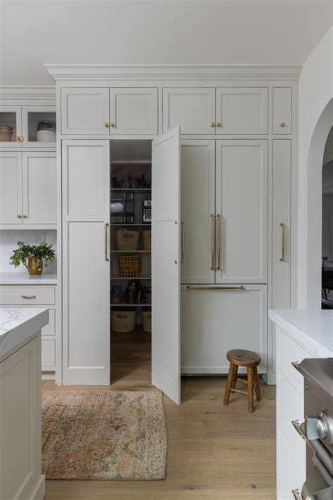 A Hidden Pantry Brings Functionality to This Bright and Cheery Kitchen ...
