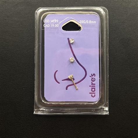 Claire's gold diamond nose piercing studs set of 3... - Depop