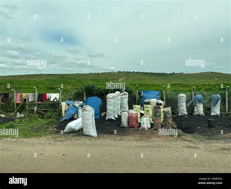 Uganda, Africa - March 25, 2023: Typical roadside scene, with bags of ...