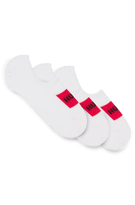 HUGO - Three-pack of invisible socks with red logo labels - White