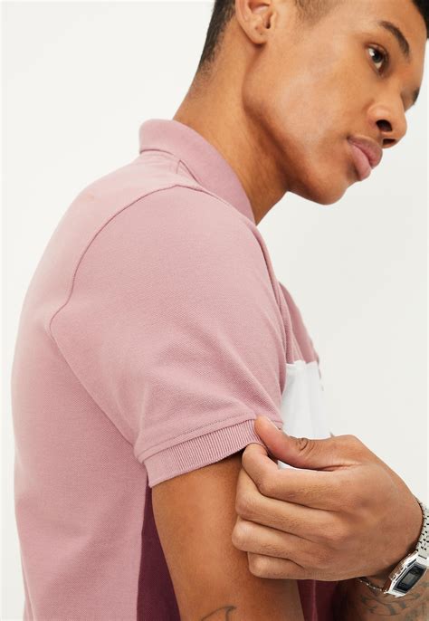 Buy Men Slim Fit Colourblocked Polo T-shirt Online at just Rs. 699.0 ...