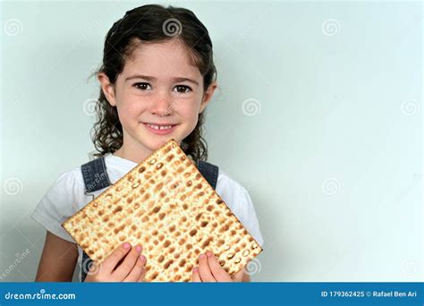 Jewish Girl Holding Matzo Bread on Passover Jewish Holiday Stock Image ...