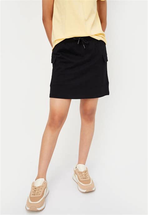 Buy Girls Solid Mini Skirt with Cargo Pockets Online at just Rs. 499.0 ...