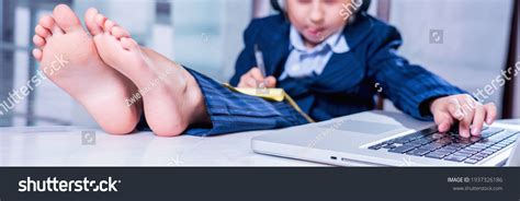 Barefoot Child Using Computer 的图像结果
