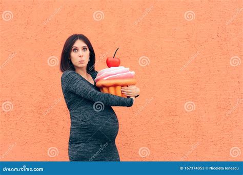 Pregnant Woman Craving Sweets Holding Huge Cupcake Stock Image - Image ...