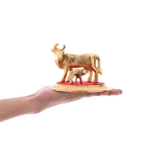 Golden Cow with Calf statue - eCraftIndia Online
