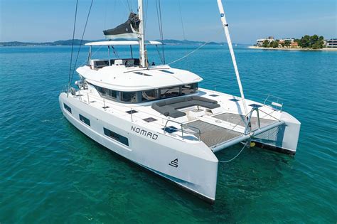 Learn about a crewed charter aboard NOMAD, a 54 ft Sailing Catamaran | Yacht Warriors: Yacht ...