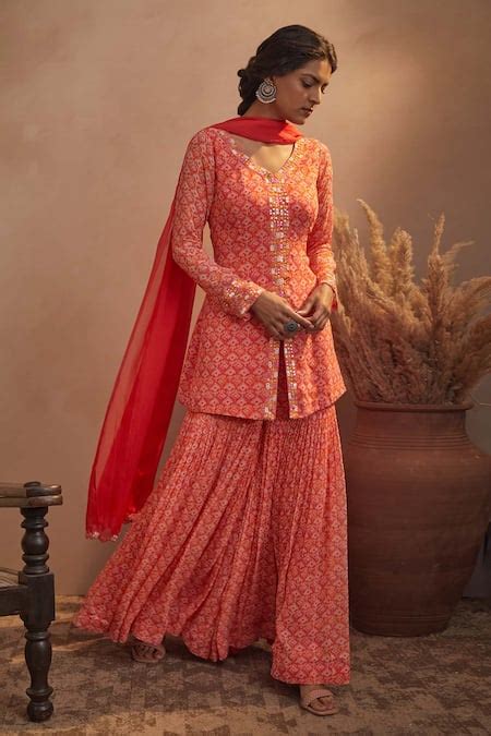 Buy Orange Georgette Ikat Print, Mirror And Thread V Neck Kurta Sharara ...