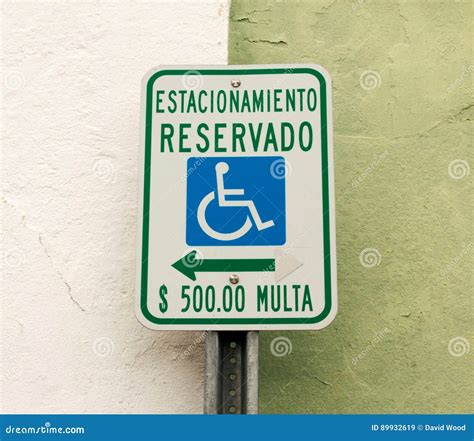 Parking Reserved for Handicapped only in Spanish Stock Image - Image of ...