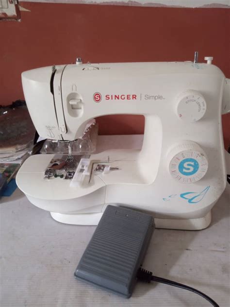 Image result for Singer Simple Sewing Machine