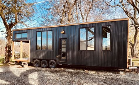 This Travel Trailer-Inspired Tiny Home Is Appropriately Equipped for ...